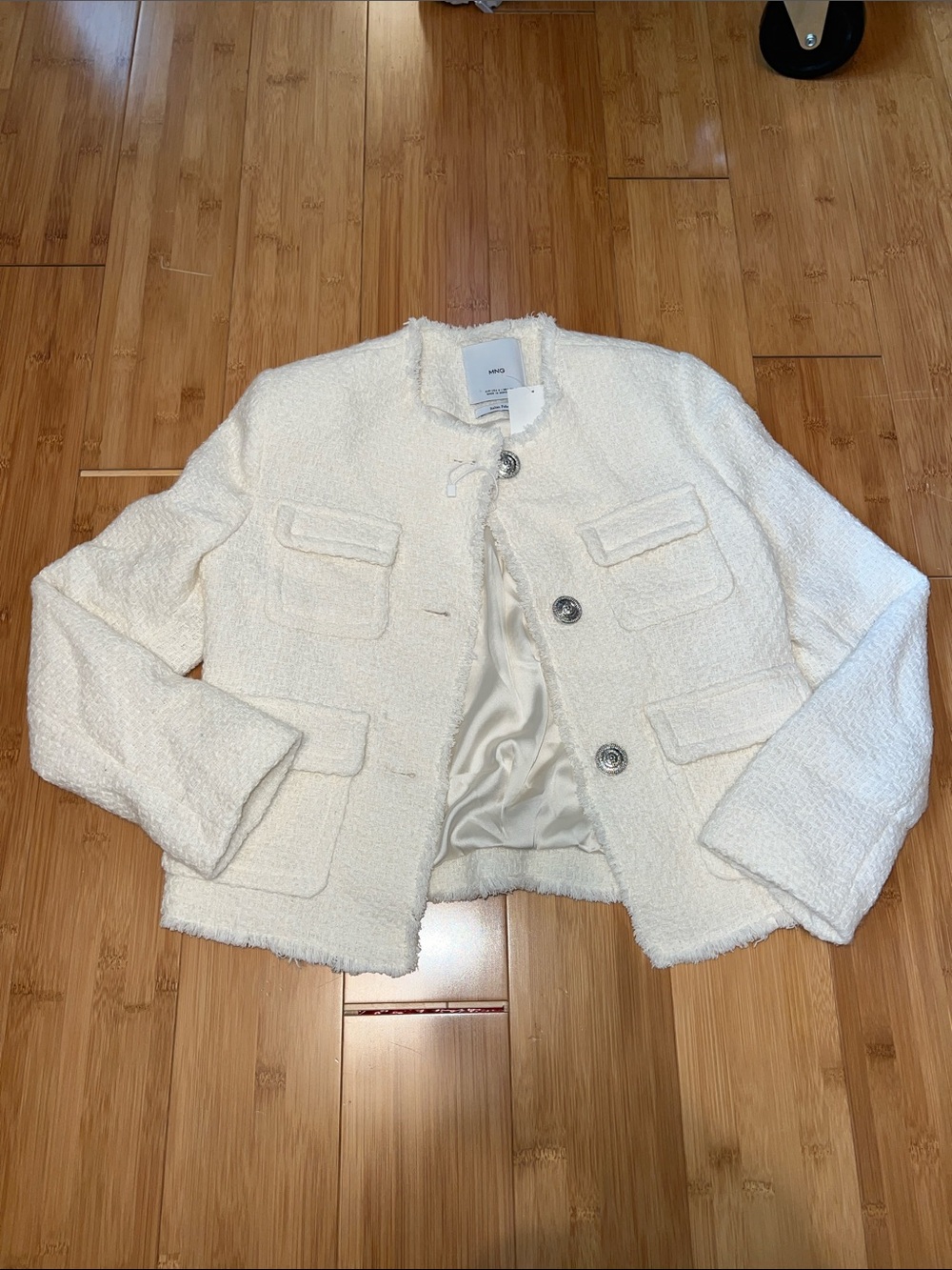 Mango blazer with manufacturer defect on shoulder
